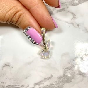 Clear Playboy belly ring